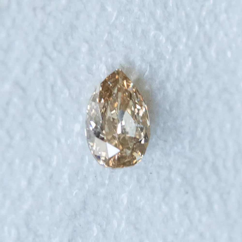 0.72CT CHAMPAGNE PEAR DIAMOND, 7.78x5.09x2.88MM, SI1 C3