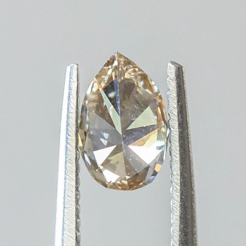 0.72CT CHAMPAGNE PEAR DIAMOND, 7.78x5.09x2.88MM, SI1 C3